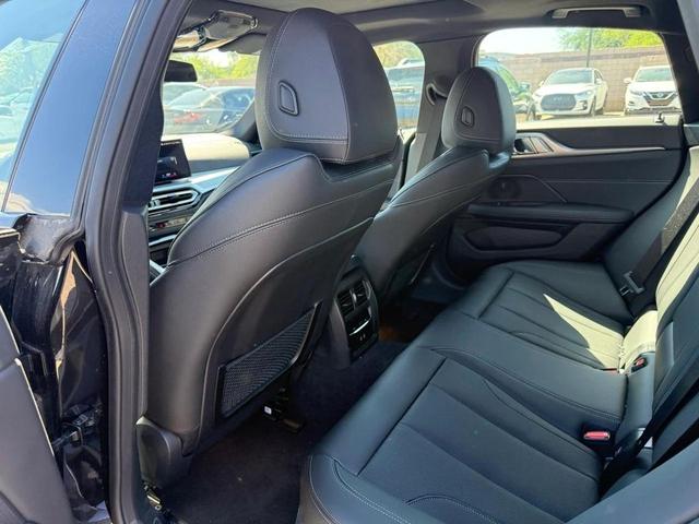 Photo of 2022 Black Sapphire Metallic BMW i4 Gran Coupe