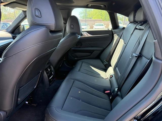 Photo of 2022 Black Sapphire Metallic BMW i4 Gran Coupe