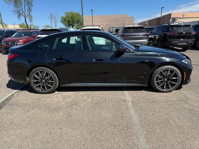 Photo of 2022 Black Sapphire Metallic BMW i4 Gran Coupe