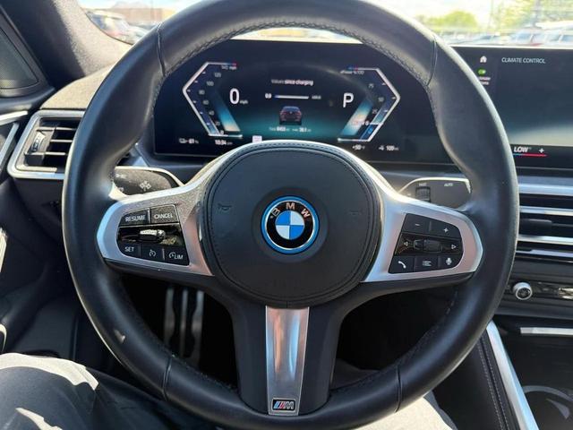 Photo of 2022 Black Sapphire Metallic BMW i4 Gran Coupe