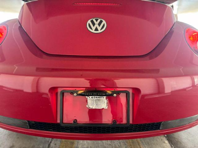 Photo of 2008 Red Volkswagen New Beetle