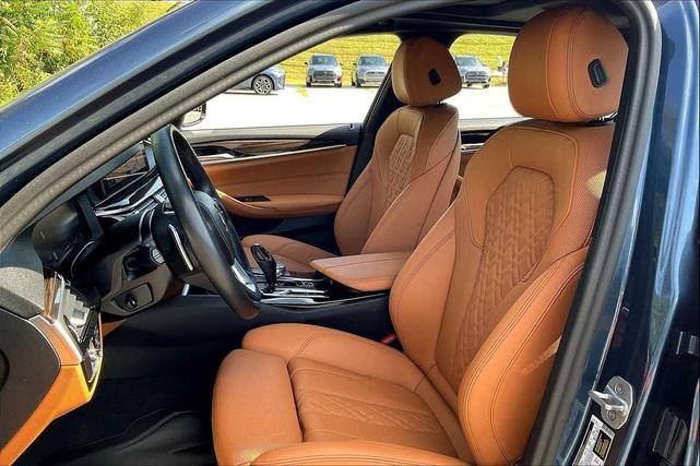 Photo of 2023 Arctic Race Blue Metallic BMW 530