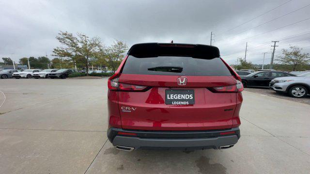 Photo of 2025 Radiant Red Metallic Honda CR-V Hybrid