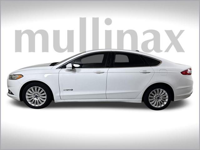 Photo of 2013 Oxford White Ford Fusion Hybrid