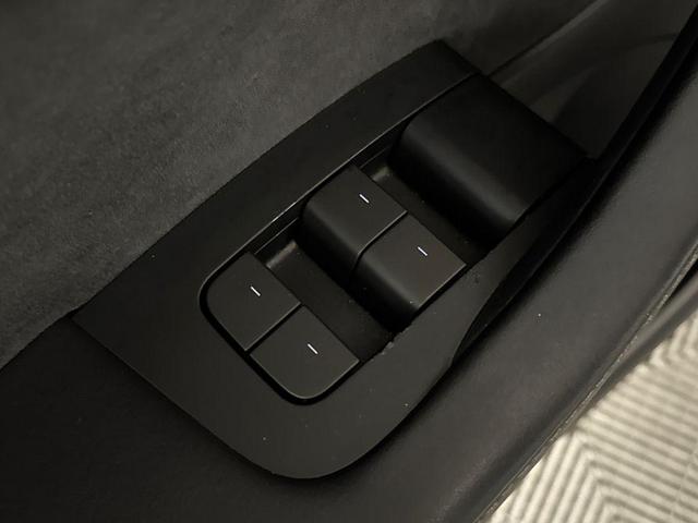 Photo of 2023 Pearl White Multi Tesla Model 3