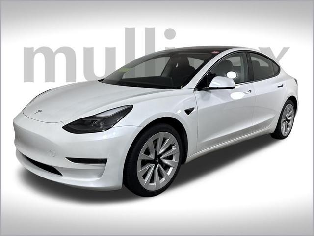 Photo of 2023 Pearl White Multi Tesla Model 3