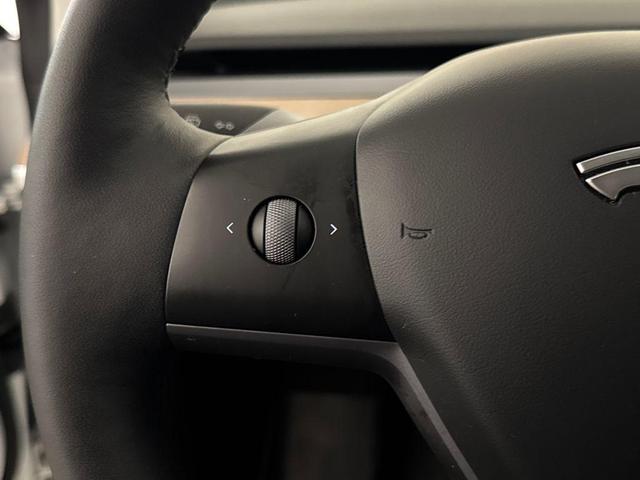 Photo of 2023 Pearl White Multi Tesla Model 3