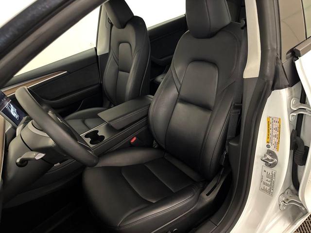 Photo of 2023 Pearl White Multi Tesla Model 3