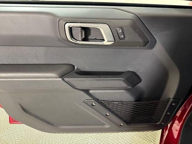 Photo of 2025 Ruby Red Metallic Tinted Clearcoat Ford Bronco