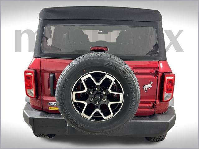 Photo of 2025 Ruby Red Metallic Tinted Clearcoat Ford Bronco