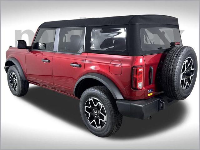 Photo of 2025 Ruby Red Metallic Tinted Clearcoat Ford Bronco