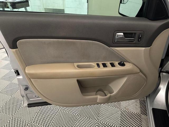 Photo of 2012 Ingot Silver Metallic Ford Fusion