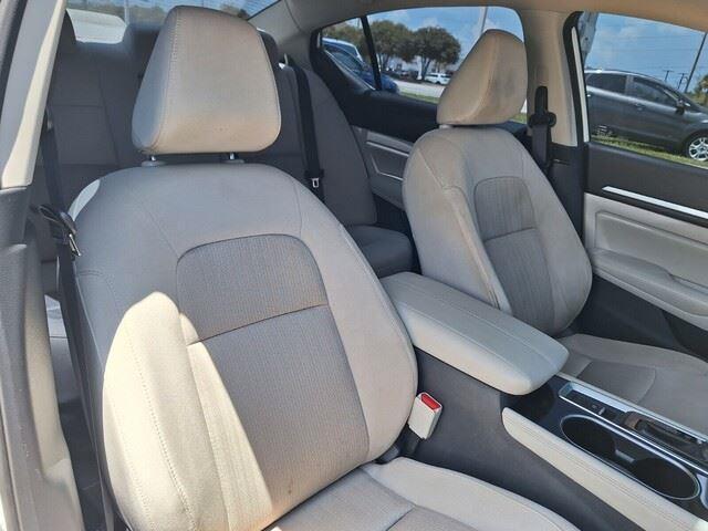 Photo of 2023 Pearl White Tricoat Nissan Altima