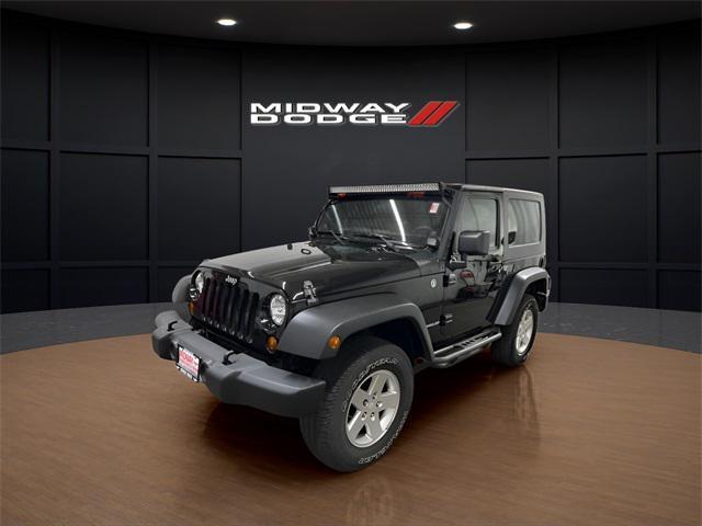 Photo of 2011 Black Clearcoat Jeep Wrangler