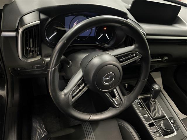 Photo of 2024 Jet Black Mica Mazda CX-50