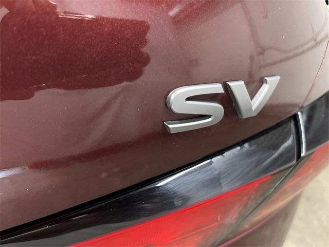 Photo of 2024 Garnet Pearl Metallic Nissan Altima