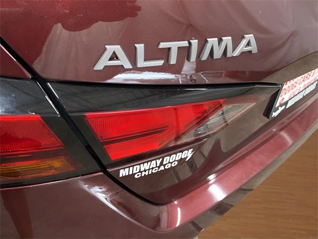 Photo of 2024 Garnet Pearl Metallic Nissan Altima