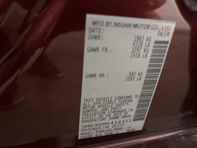 Photo of 2024 Garnet Pearl Metallic Nissan Altima