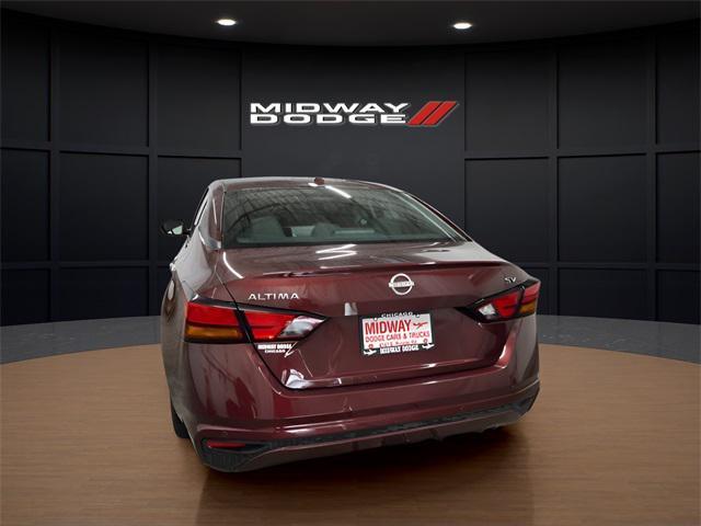 Photo of 2024 Garnet Pearl Metallic Nissan Altima