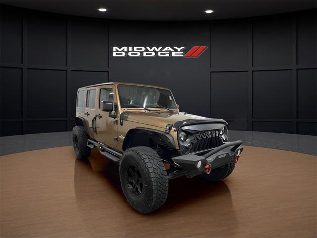 Photo of 2015 Copper Brown Pearlcoat Jeep Wrangler Unlimited