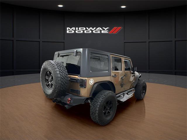 Photo of 2015 Copper Brown Pearlcoat Jeep Wrangler Unlimited