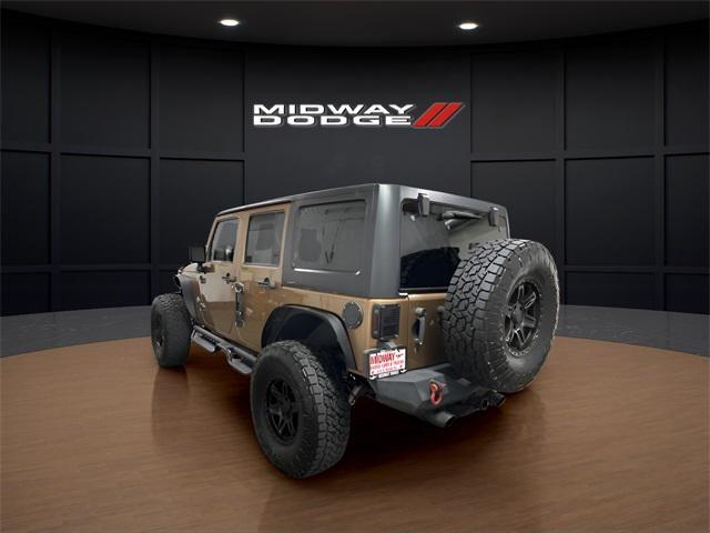 Photo of 2015 Copper Brown Pearlcoat Jeep Wrangler Unlimited
