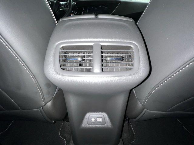 Photo of 2023 Cinnabar Metallic Buick Envision