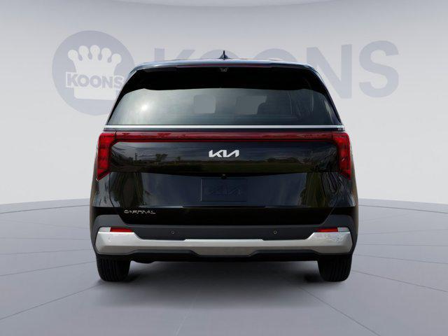 Photo of 2025 Aurora Black Pearl Kia Carnival