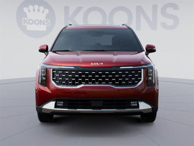 Photo of 2025 Flare Red Kia Carnival Hybrid