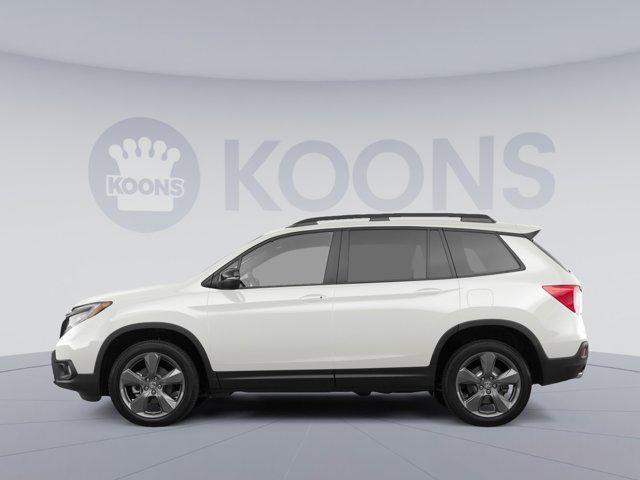 Photo of 2019 White Diamond Pearl Honda Passport