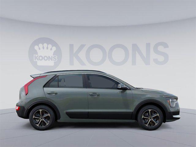 Photo of 2025 Cityscape Green Kia Niro
