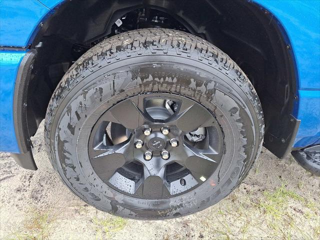 Photo of 2025 Hydro Blue Pearlcoat RAM 1500