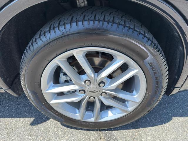 Photo of 2024 DB Black Clearcoat Dodge Durango