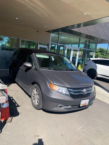 Photo of 2016 Smoky Topaz Metallic Honda Odyssey