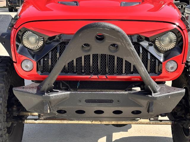 Photo of 2016 Firecracker Red Clearcoat Jeep Wrangler Unlimited