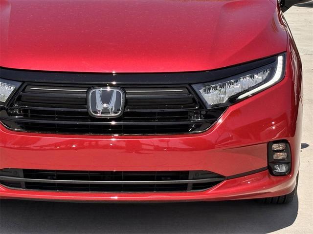 Photo of 2023 Radiant Red Metallic II Honda Odyssey