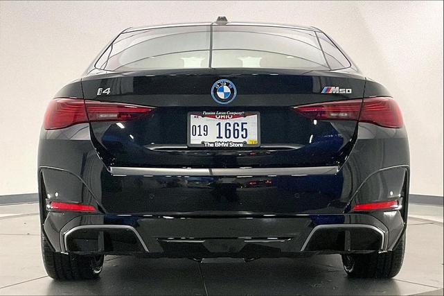 Photo of 2025 Black Sapphire Metallic BMW i4 Gran Coupe