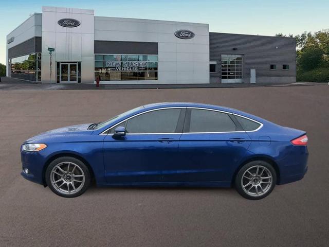Photo of 2015 Deep Impact Blue Ford Fusion