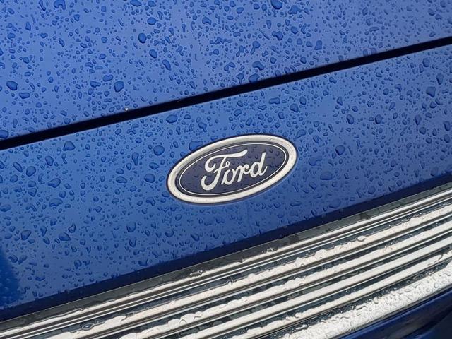 Photo of 2015 Deep Impact Blue Ford Fusion