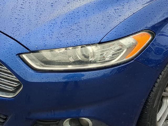 Photo of 2015 Deep Impact Blue Ford Fusion