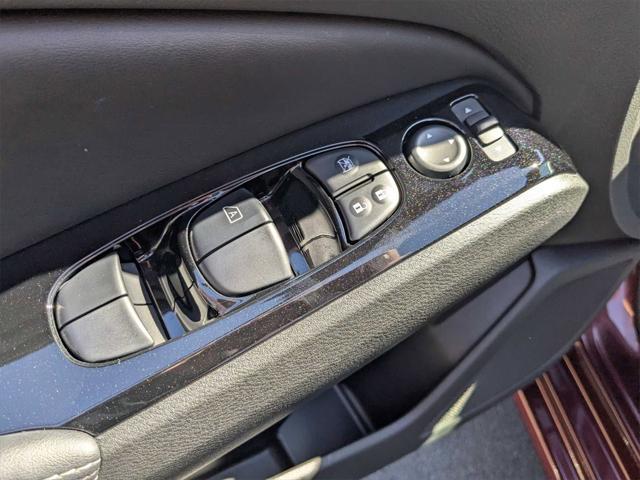 Photo of 2023 Garnet Pearl Metallic Nissan Altima