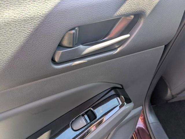 Photo of 2023 Garnet Pearl Metallic Nissan Altima