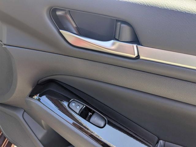 Photo of 2023 Garnet Pearl Metallic Nissan Altima