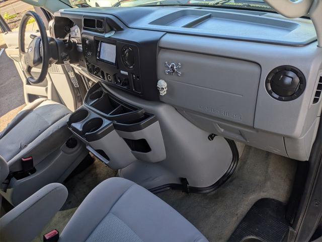 Photo of 2012 Black Ford E350 Super Duty