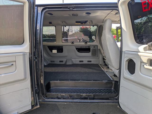 Photo of 2012 Black Ford E350 Super Duty