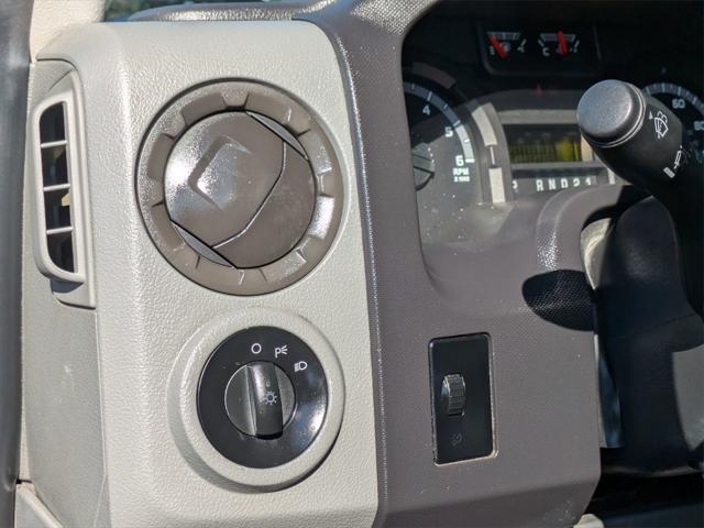 Photo of 2012 Black Ford E350 Super Duty