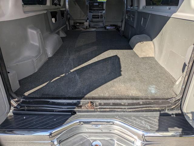 Photo of 2012 Black Ford E350 Super Duty