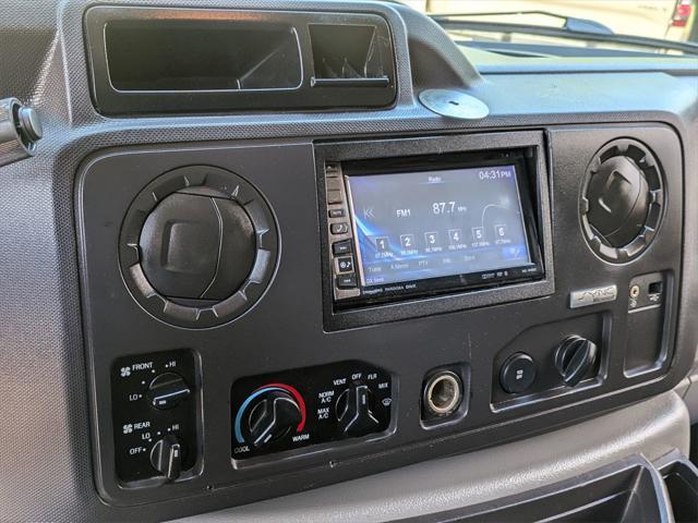 Photo of 2012 Black Ford E350 Super Duty