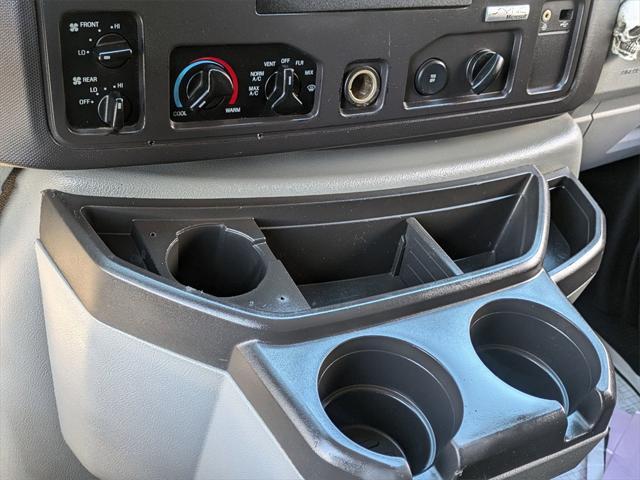 Photo of 2012 Black Ford E350 Super Duty