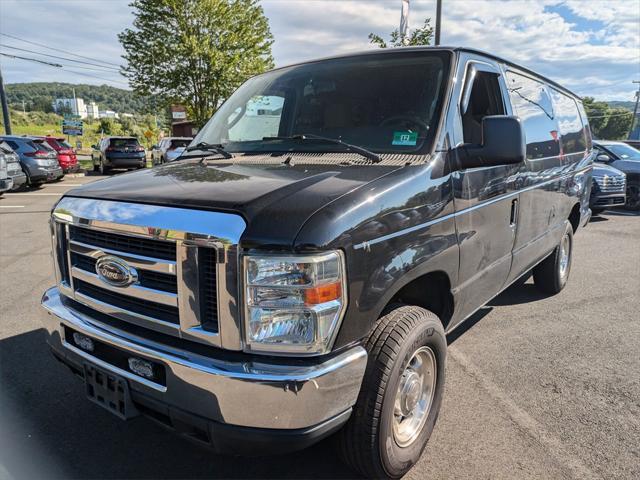 Photo of 2012 Black Ford E350 Super Duty